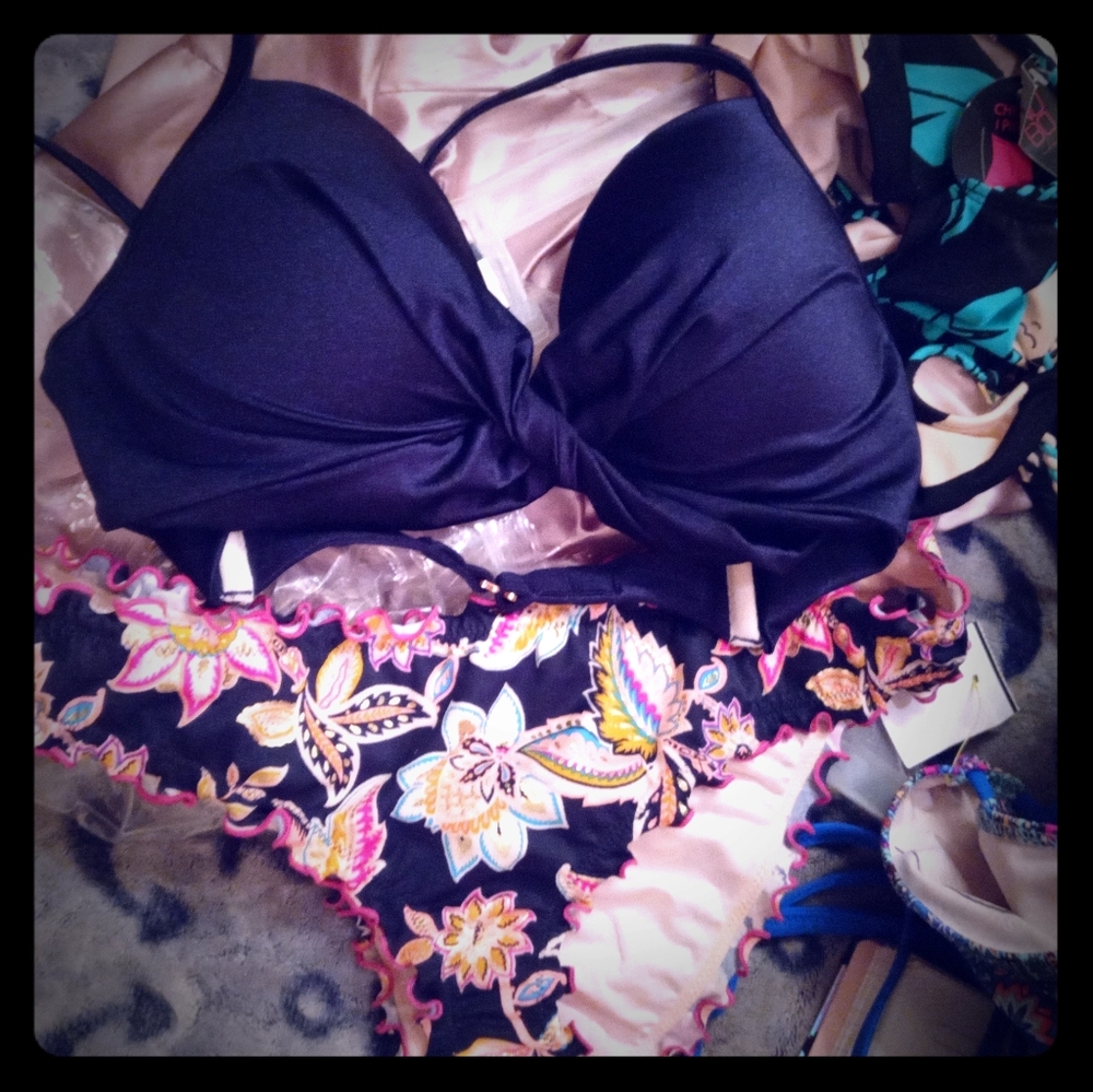 Navy. Blue bikini top with navy blue with pink flo